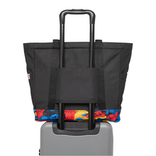 Load image into Gallery viewer, Back panel view of the tote bag attached to the telescopic handle of a suitcase.
