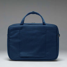 Load image into Gallery viewer, Back panel view of the Indigo Mood Gibson bag on a gray gradient background.
