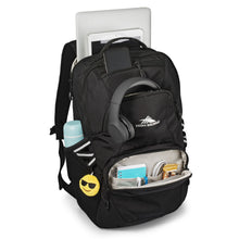 Load image into Gallery viewer, Angled front view of the black backpack. The compartments are open and filled with stationery, electronics, and a water bottle.
