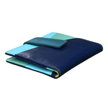 Load image into Gallery viewer, Angled view of the serenity blue wallet. 
