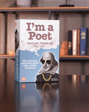 Load image into Gallery viewer, Front panel view of the I'm a Poet packaging on a living room setting. 
