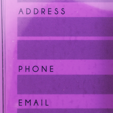 Load image into Gallery viewer, Close up to the purple luggage tag. 
