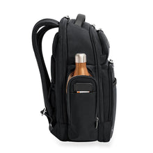 Load image into Gallery viewer, Briggs &amp; Riley @Work Large Cargo Backpack in Black

Image of Side Panel View hydration pocket, ideal for water bottle or travel thermos.

Dimensions: 18.75 x 16 x 8.75 in / 47.6 x 40.6 x 22.2 cm
