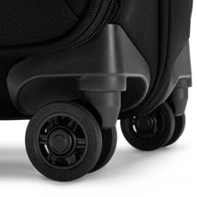 Load image into Gallery viewer, Angled close up to two tires on the black spinner brief. 
