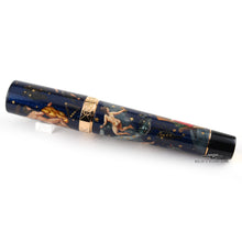 Load image into Gallery viewer, Side view of the fountain pen with the cap on.
