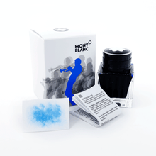 Load image into Gallery viewer, The blue ink bottle, packaging, instructions and color sample on a white background.

