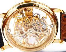 Load image into Gallery viewer, Gold mechanical watch with intricate design on a white background
