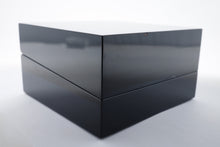 Load image into Gallery viewer, Angled view of the black lacquer presentation box. It has a small chip on the front.
