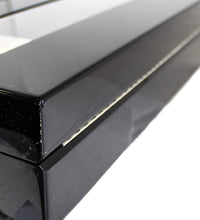 Load image into Gallery viewer, Close up to the back corner of the presentation box. it has a fisure.
