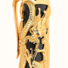 Load image into Gallery viewer, Close-up of Dragon&#39;s face on the pen&#39;s cap, in gold overlay. Displayed in a white background.
