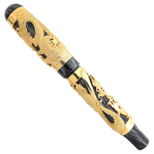 Load image into Gallery viewer, The Montegrappa 1995 Dragon fountain pen, capped, in gold overlay, featuring an intricate dragon design on a black marbled celluloid body, displayed on a white background.
