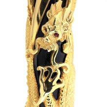 Load image into Gallery viewer, Close-up of Dragon&#39;s face on the pen&#39;s body, in gold overlay. Displayed in a white background.
