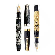 Load image into Gallery viewer, Uncapped Montegrappa Chinese Zodiac Rat fountain pens in gold and silver overlay, featuring intricate Rat engravings on black resin bodies, displayed on a white background.
