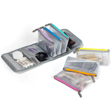 Load image into Gallery viewer, The six pouches arranged with the carrying case.
