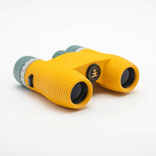 Load image into Gallery viewer, Angled view of the yellow binoculars with gray accents. 
