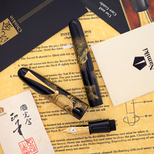 Load image into Gallery viewer, Pen cap, body, and nib on a paper background.
