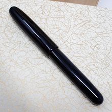 Load image into Gallery viewer, Back view of the fountain pen with the cap 

