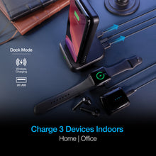 Load image into Gallery viewer, The power bank charging a cellphone, earbuds case, and smart watch via wired and wireless features.
