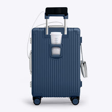 Load image into Gallery viewer, Back panel view of the navy blue suitcase showing a phone held by the telescopic handle and a hot drink in the cup holder.
