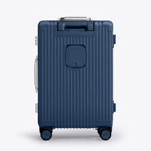 Load image into Gallery viewer, Back panel view of the navy blue suitcase. 
