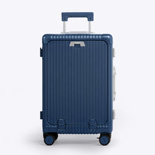 Load image into Gallery viewer, Front panel view of the navy blue carry-on suitcase. The telescopic handle is partly extended. 

