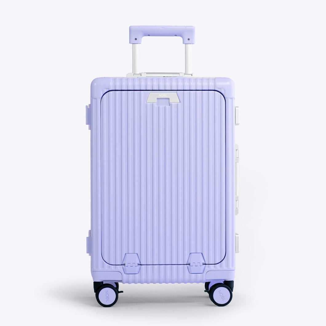Front panel view of the lavender suitcase. The telescopic handle is partly extended. 