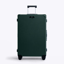 Load image into Gallery viewer, Front panel view of the large green suitcase. The telescopic handle is extended. 
