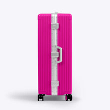 Load image into Gallery viewer, Side panel view of the hot pink suitcase. 
