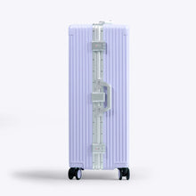 Load image into Gallery viewer, Side panel view of the lavender suitcase. It features two TSA-approved three-digit combination clasp locks and a grab handle. 
