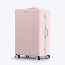 Load image into Gallery viewer, Angled front view of the large pink suitcase with silver-colored accents. The telescopic handle is retracted.
