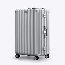 Load image into Gallery viewer, Angled front view of the silver suitcase. The telescopic handle is retracted.
