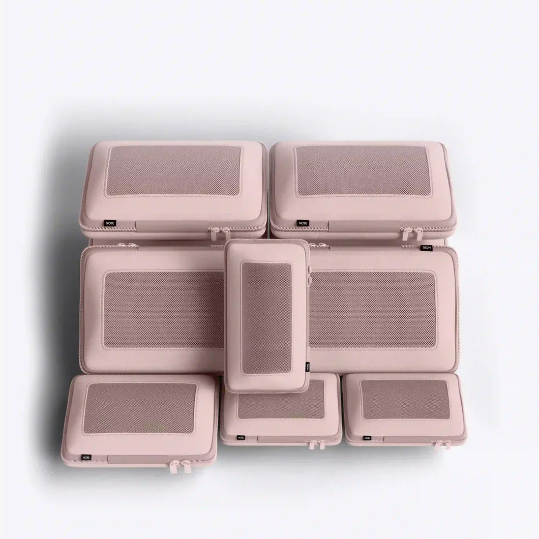 The pack of six light pink packing cases arranged in a white background