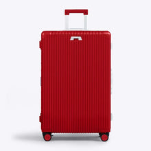 Load image into Gallery viewer, Front panel view of the red suitcase with the telescopic handle partly extended. 

