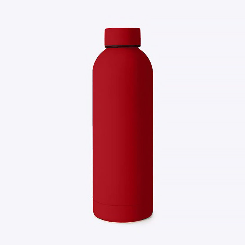 Red water bottle on a white background.