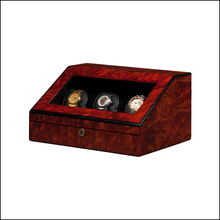 Load image into Gallery viewer, A luxury watch winder box made of reddish-brown burl wood with a black interior, featuring a hinged lid with a clear window displaying three watches.

