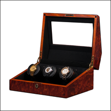Load image into Gallery viewer, A luxury watch winder box made of reddish-brown burl wood with a clear glass lid, shown open to display three automatic wristwatches on black rotating cushions inside.
