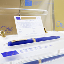 Load image into Gallery viewer, Side view of the fountain pen with the cap on in the presentation box.
