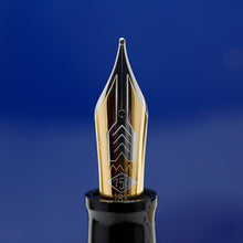Load image into Gallery viewer, Front view of the two-toned fountain pen nib. 
