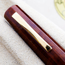 Load image into Gallery viewer, Close up to the cap's clip.
