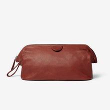 Load image into Gallery viewer, Front view of the brandy leather travel kit. 

