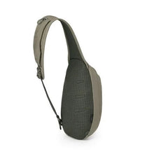 Load image into Gallery viewer, Angled back panel view of the tan sling bag with the shoulder strap extended.
