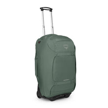 Load image into Gallery viewer, Front view of the green travel pack with the telescopic handle extended.
