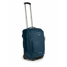 Load image into Gallery viewer, Angled front view of a blue suitcase with the telescopic handle extended.
