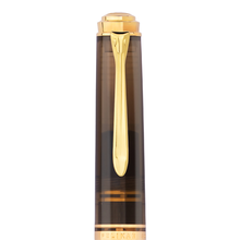 Load image into Gallery viewer, Close-up of the Pelikan gold clip on a white background.
