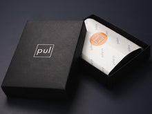 Load image into Gallery viewer, Packaging for the Pularys Boston wallet: A black card stock box with the Pularys logo on the lid. 
