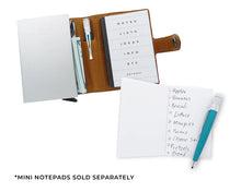 Load image into Gallery viewer, Interior view of the cognac wallet with a notepad tucked in the interior. Text: Mini Notepads sold separately. 
