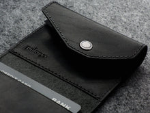 Load image into Gallery viewer, Interior close up to the wallet with Pularys logo embossing. 
