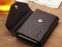 Load image into Gallery viewer, The brown wallet with the flap lid opened. 
