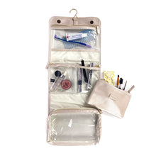 Load image into Gallery viewer, The Toiletry Case extended with the separate zipper closing bag, both filled with cosmetics and dental hygiene products.
