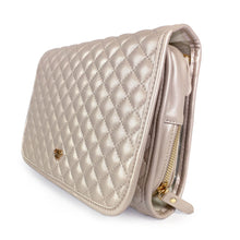 Load image into Gallery viewer, Angled front view of the quilted foldable hanging toiletry case. 
